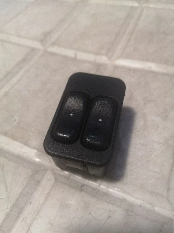 Electric window control switch 90561086