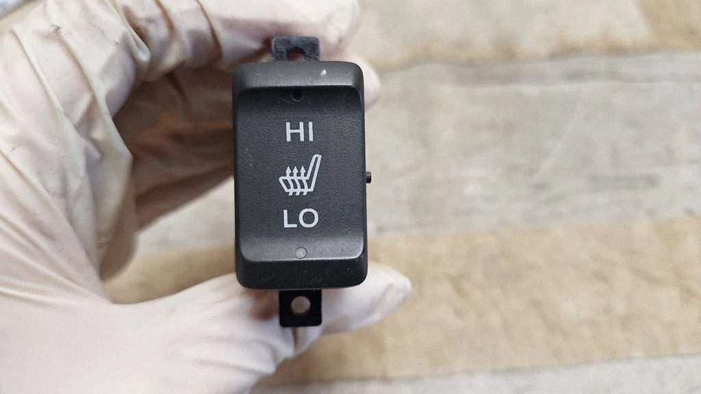 Seat heating switch M22831