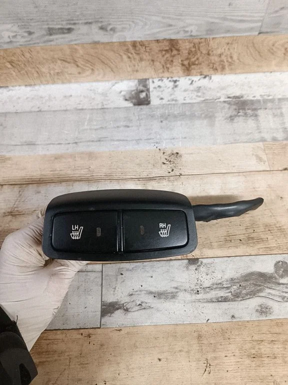 Seat heating switch