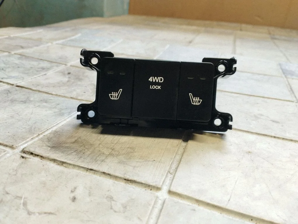 Seat heating switch
