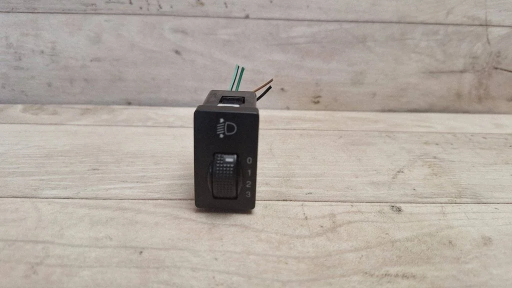 Headlight level height control switch