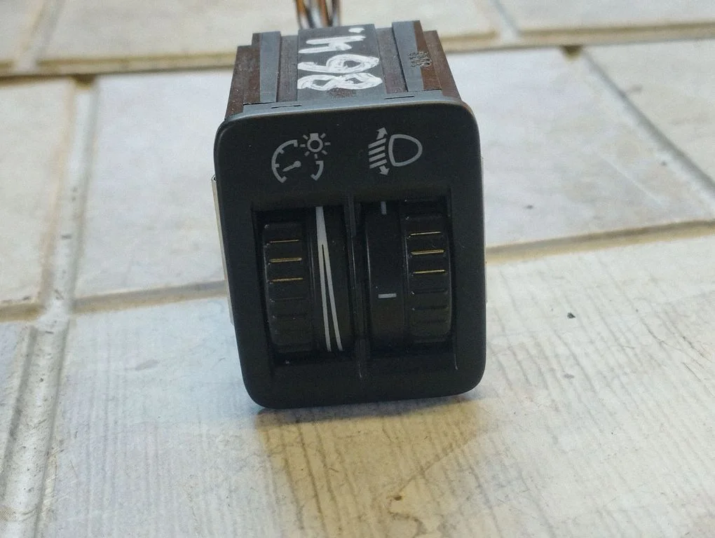 Headlight level height control switch – Volkswagen Passat CC (2008-2016)