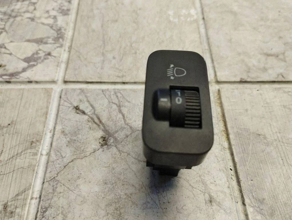 Headlight level height control switch – Honda Jazz (2002-2008)
