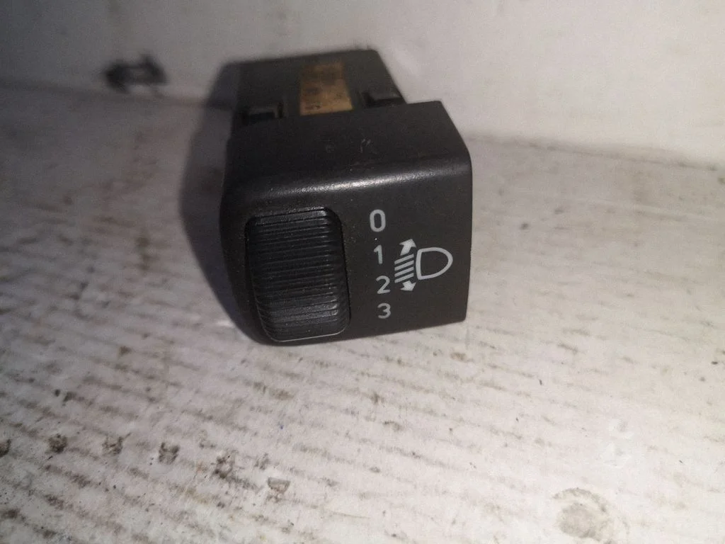 Headlight level height control switch 5106257