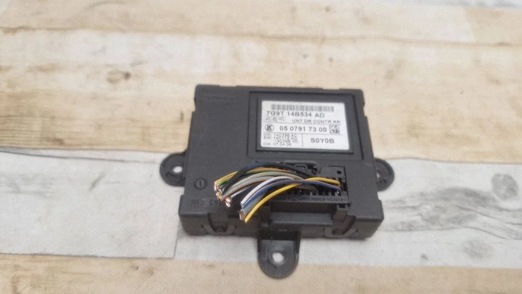 Door control unit/module 7G9T14B534AD