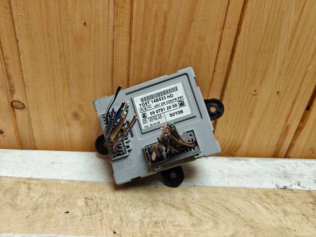 Door control unit/module 7G9T14B533HD
