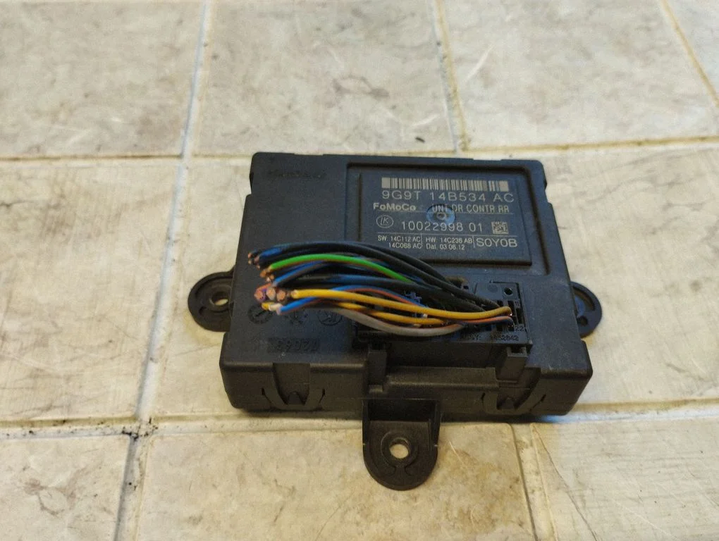 Ukseelektroonika juhtplokk 9G9T14B534AC