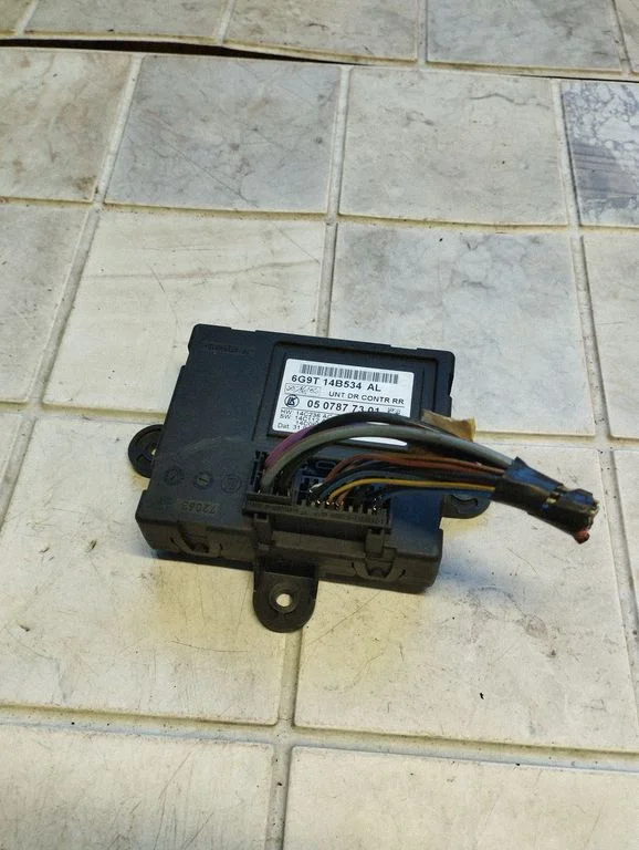 Door control unit/module 6G9T14B534AL