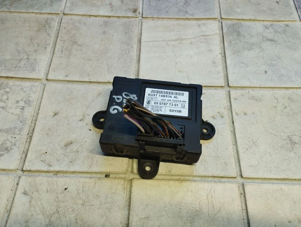 Door control unit/module 6G9T14B534AL