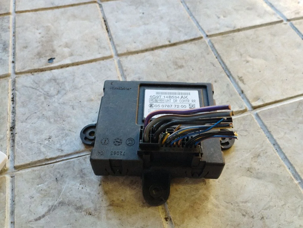 Door control unit/module 6G9T14B534AK