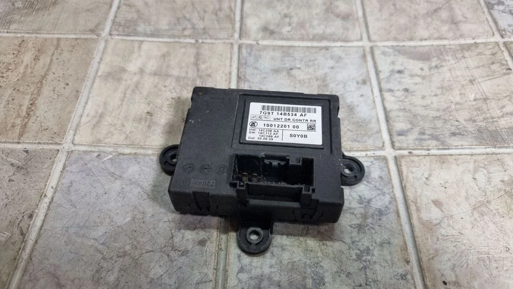 Door control unit/module 7G9T14B534AF