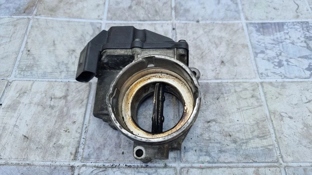 Throttle valve – Volkswagen Touran I (2003-2010)