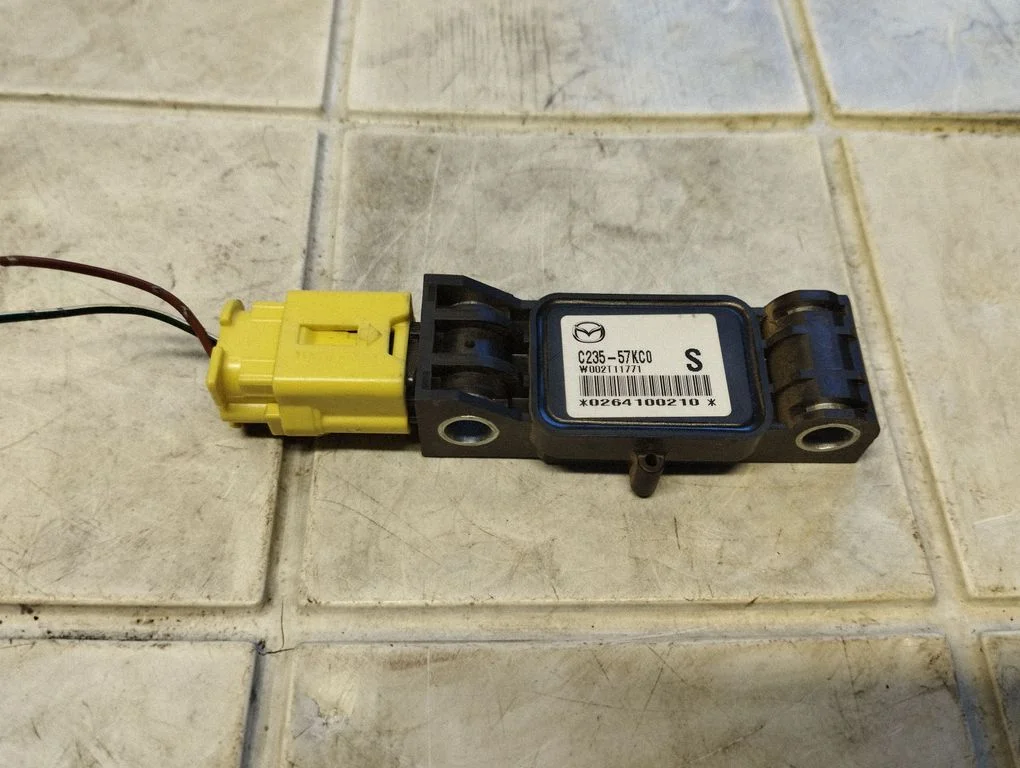 Airbag deployment crash/impact sensor C23557KC0