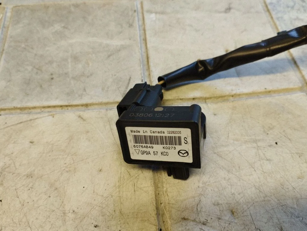 Airbag deployment crash/impact sensor GP9A57KC0