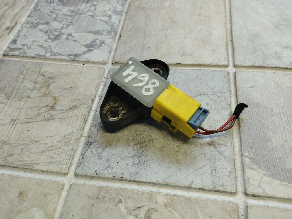 Airbag deployment crash/impact sensor 8K0973323T