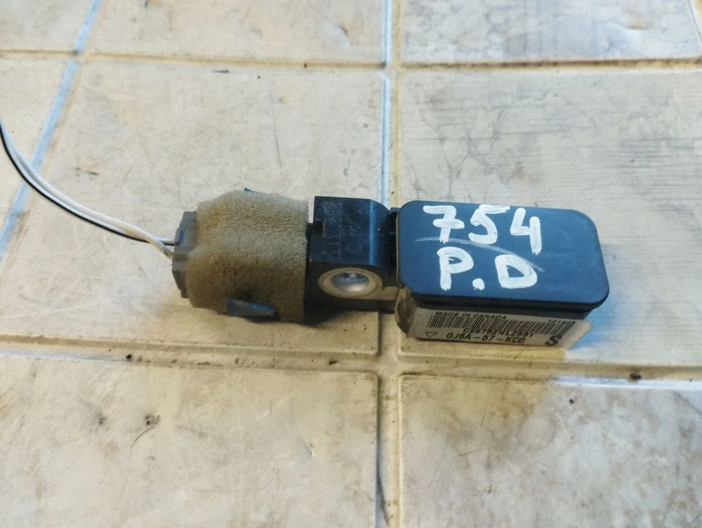 Airbag deployment crash/impact sensor GJ6A57KC0