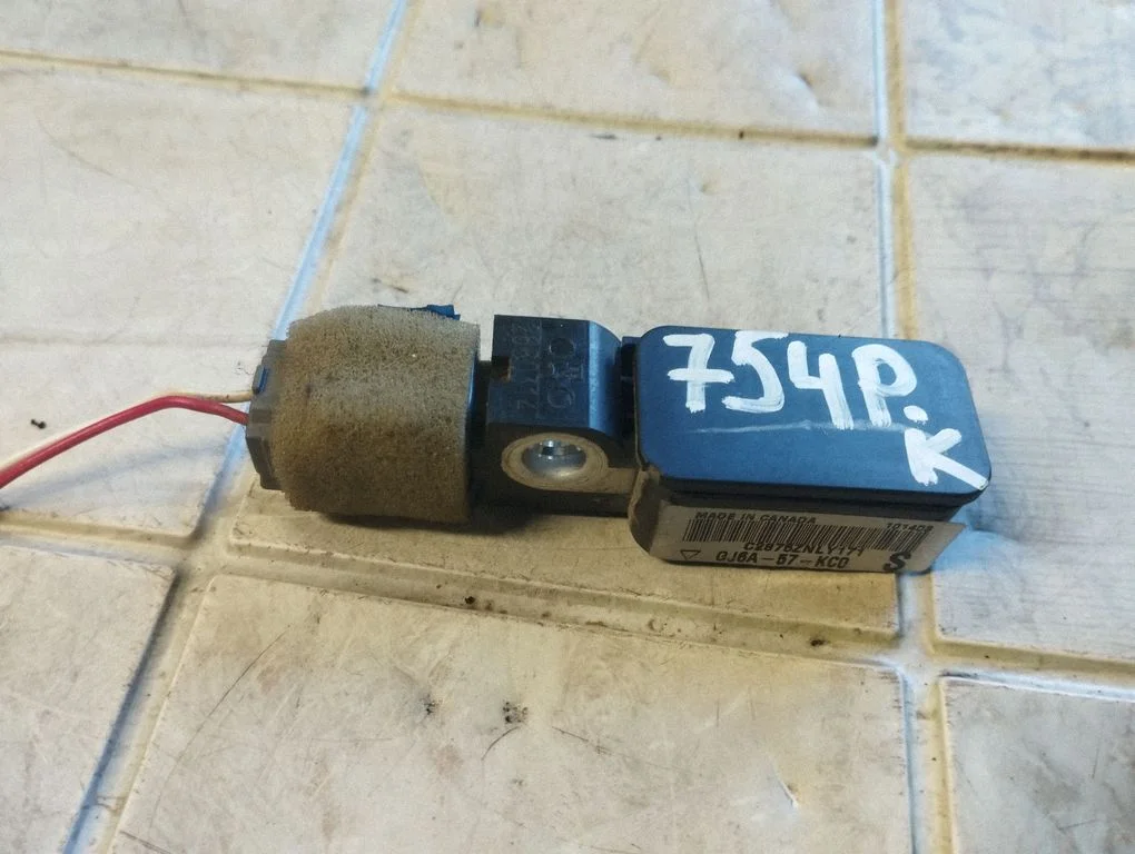 Airbag deployment crash/impact sensor GJ6A57KC0
