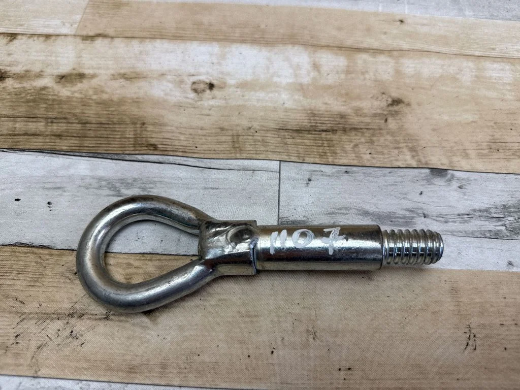 Towing hook eye