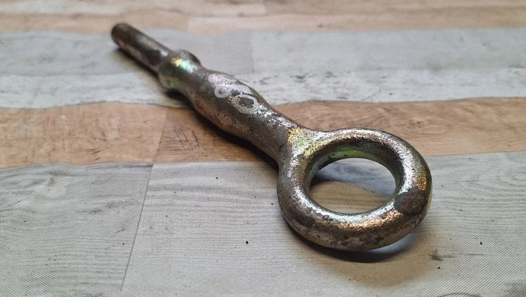 Towing hook eye