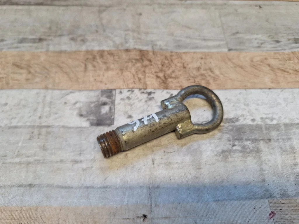 Towing hook eye