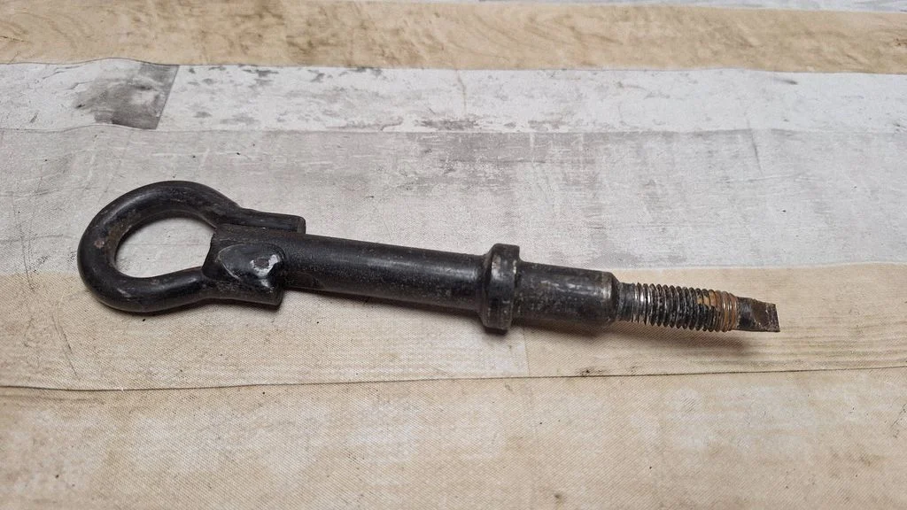 Towing hook eye