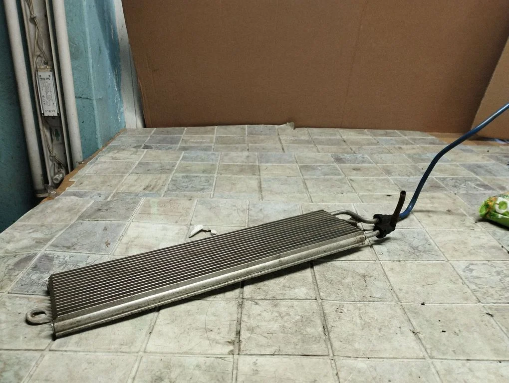 Fuel cooler (radiator) – Volkswagen Passat B6 (2005-2010)