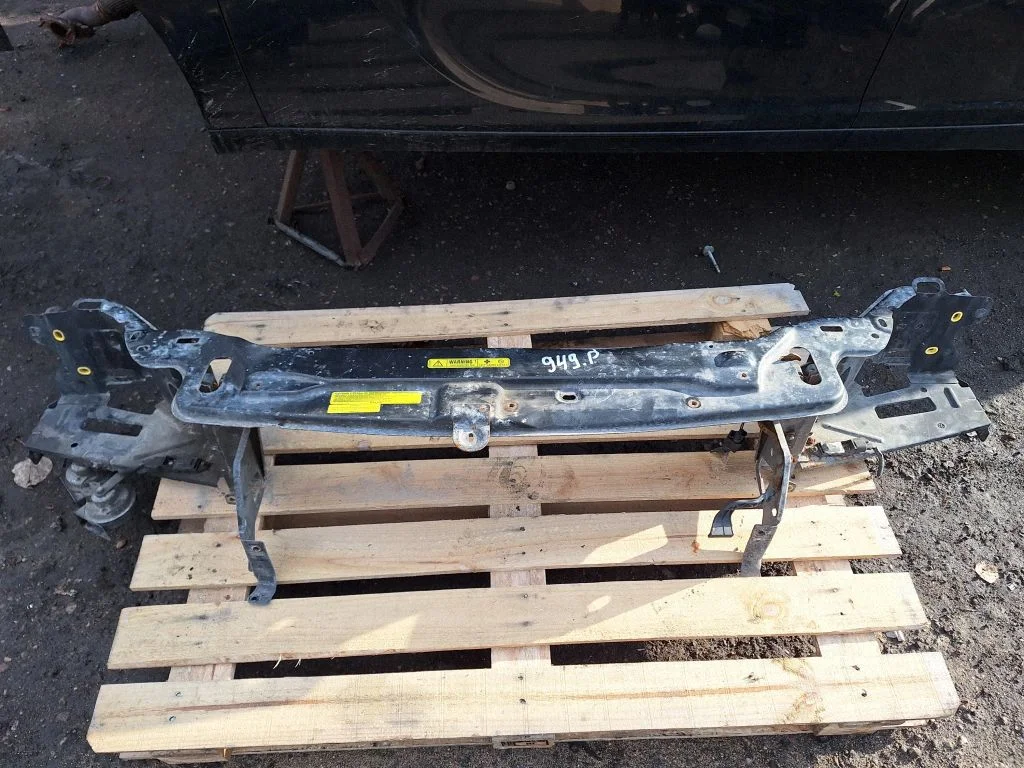 Top upper radiator support slam panel