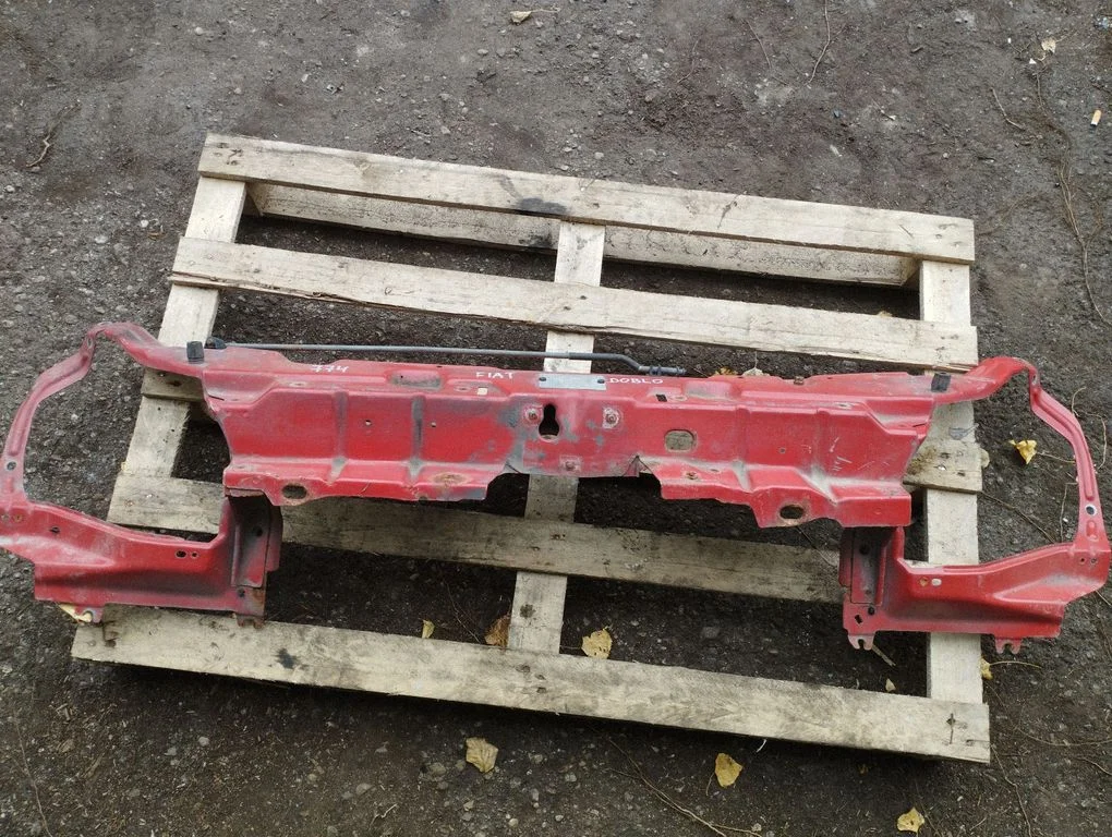 Top upper radiator support slam panel