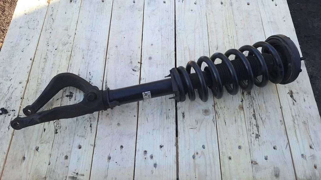 Front shock absorber with coil spring – front right