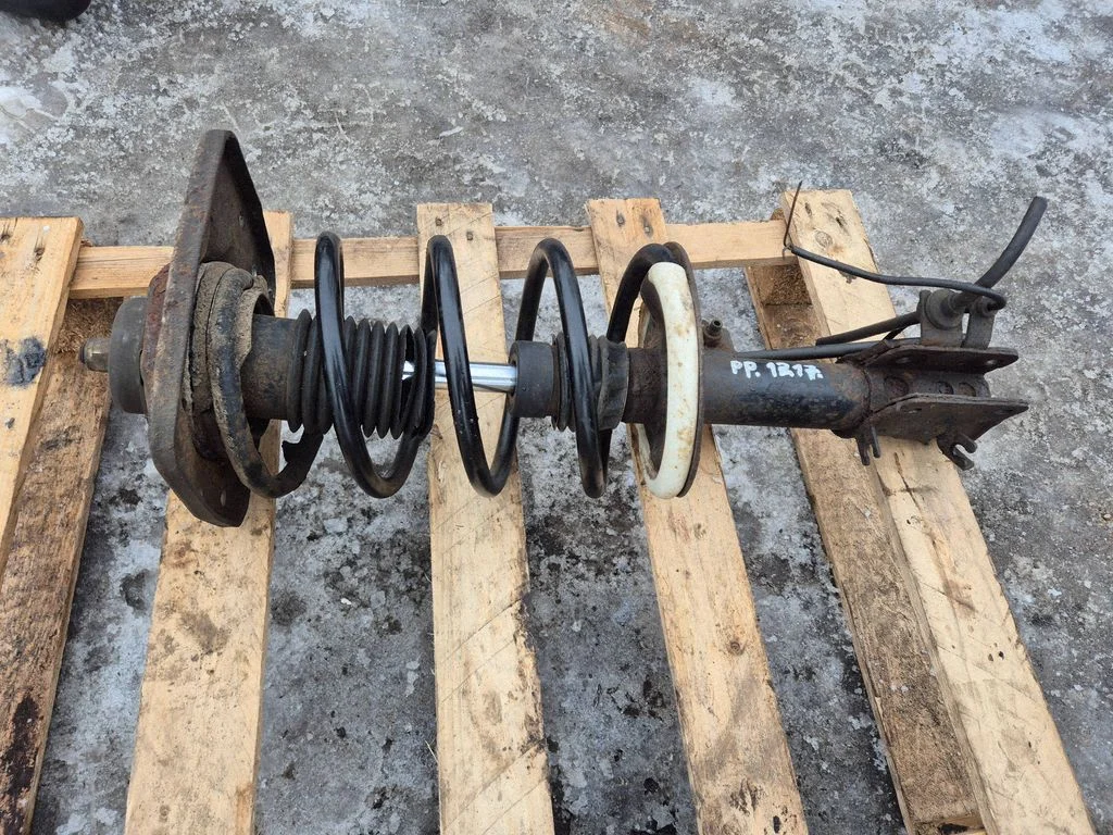 Front shock absorber with coil spring – front right
