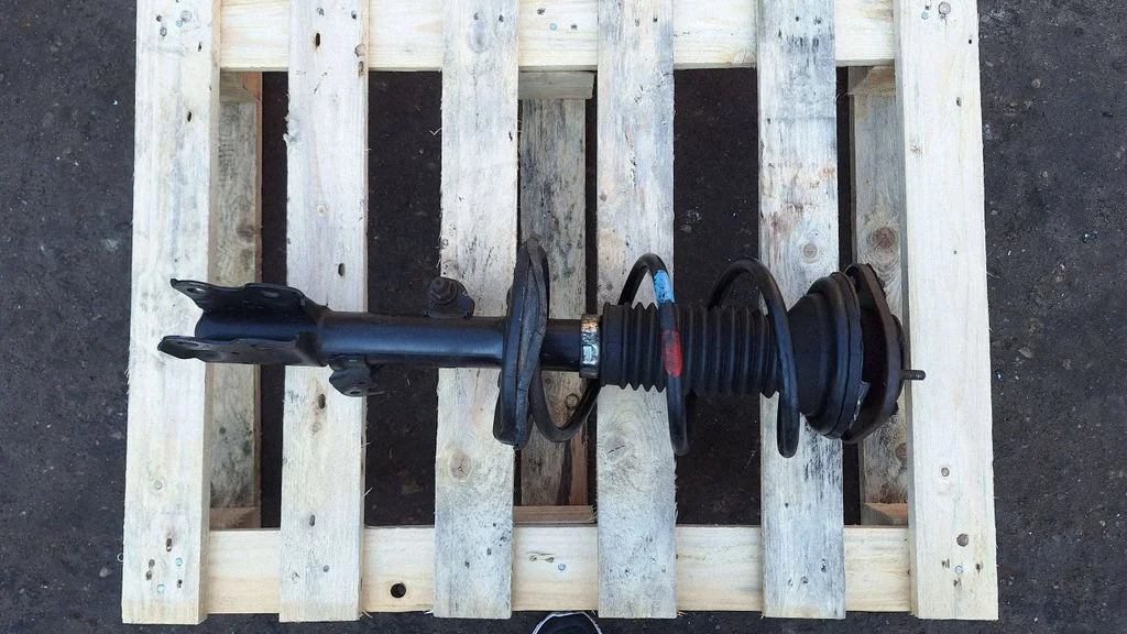 Front shock absorber with coil spring – front right