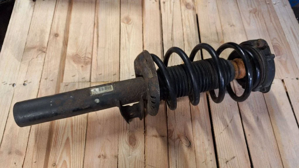 Front shock absorber with coil spring 1T0413031FK