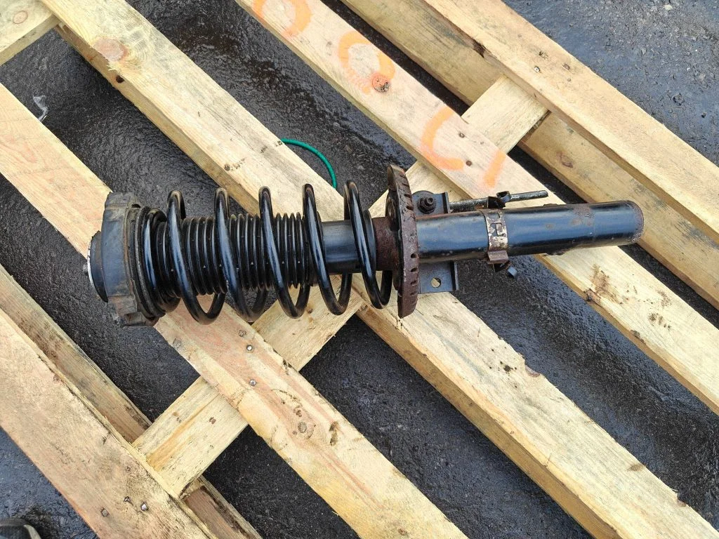 Front shock absorber with coil spring – front right