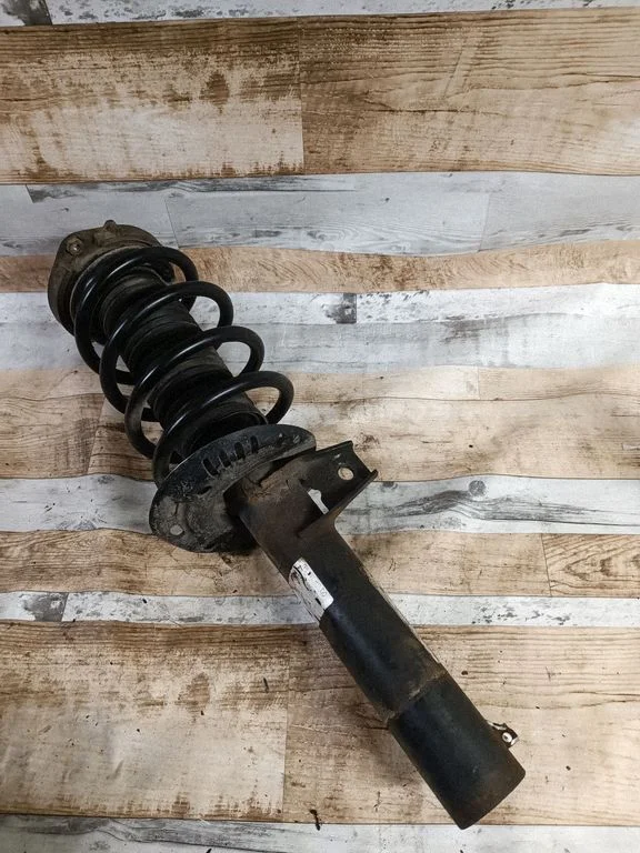 Front shock absorber with coil spring – front right