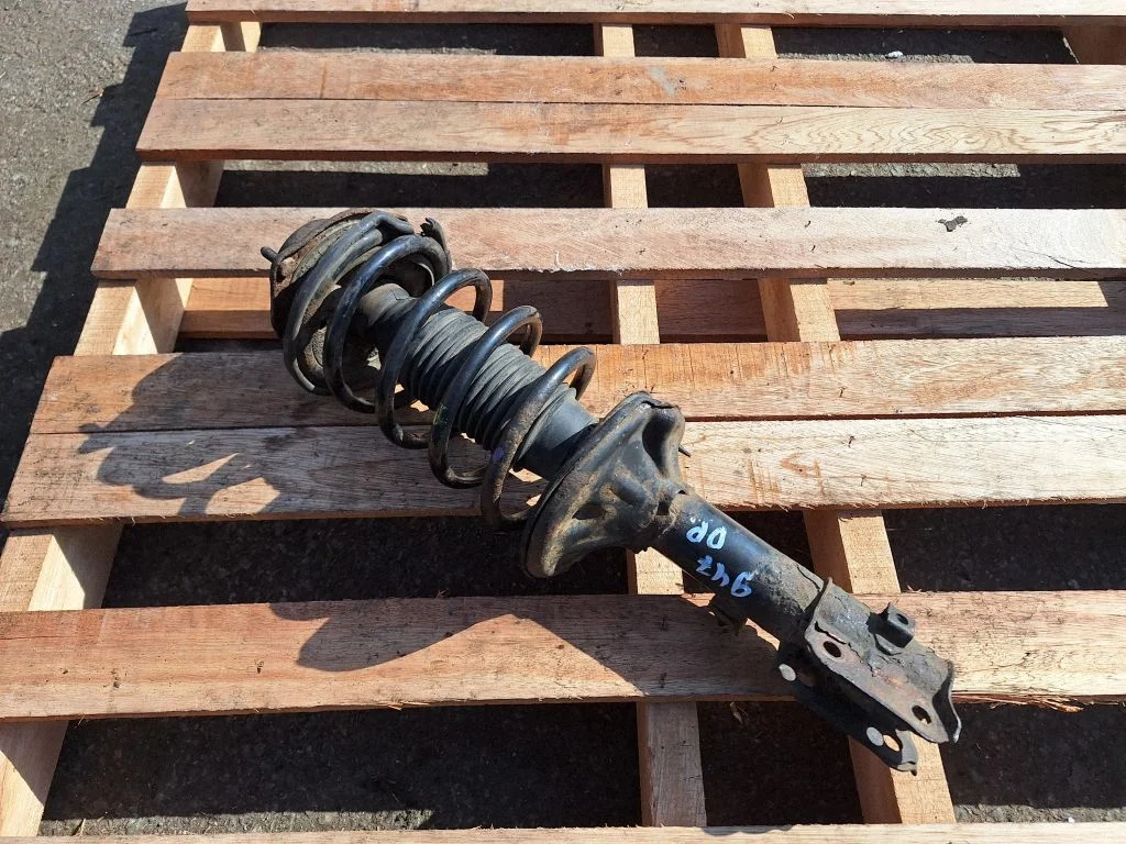 Front shock absorber with coil spring – front right