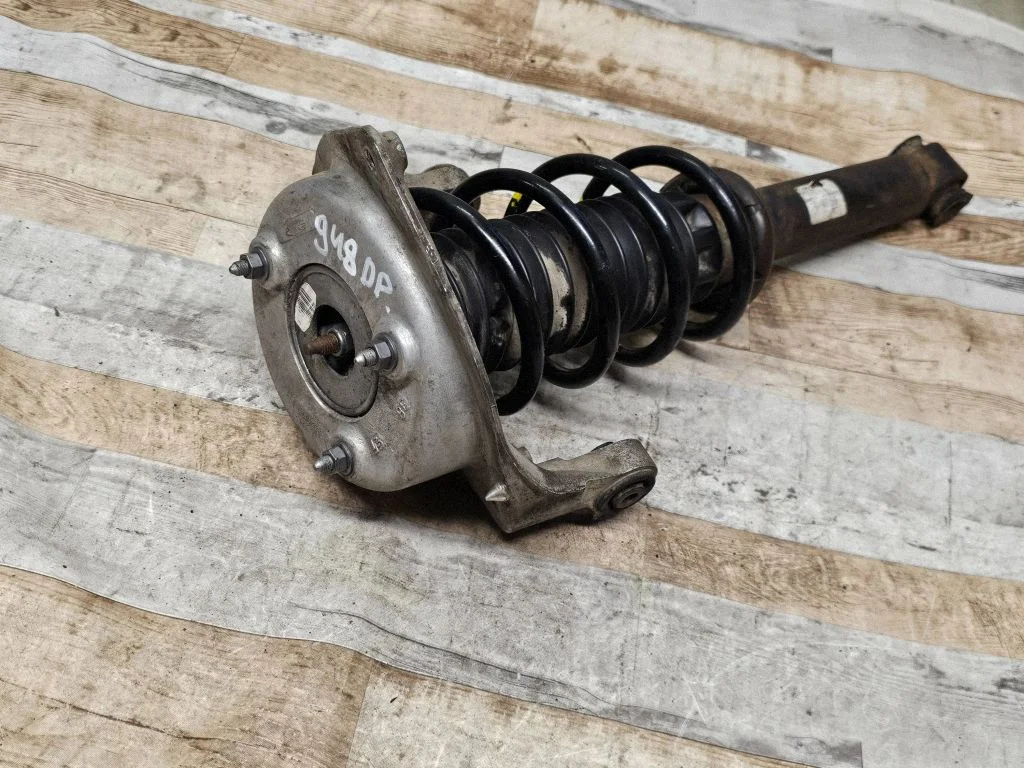 Front shock absorber with coil spring – front right