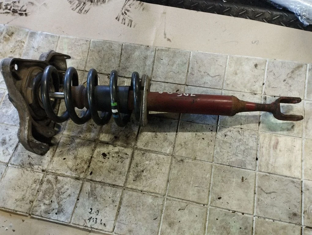 Front shock absorber with coil spring – front right