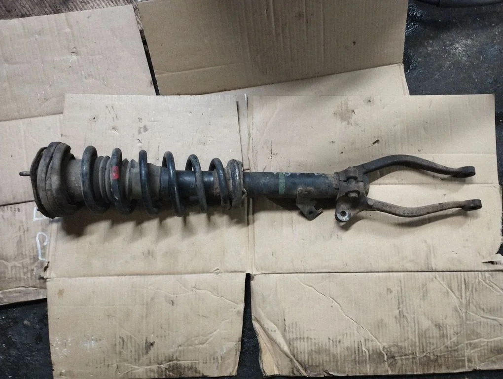 Front shock absorber with coil spring – front right