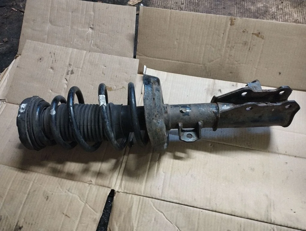 Front shock absorber with coil spring – Opel Insignia A (2008-2017)