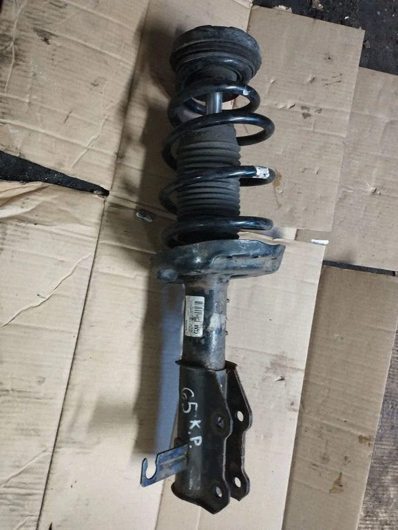 Front shock absorber with coil spring – Opel Insignia A (2008-2017)
