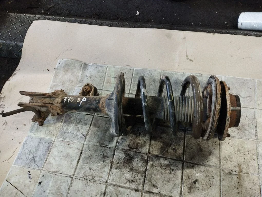 Front shock absorber with coil spring – front right