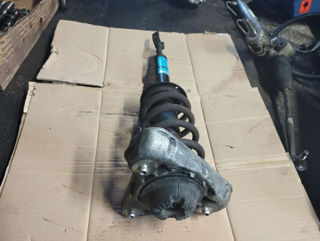 Front shock absorber with coil spring 558301