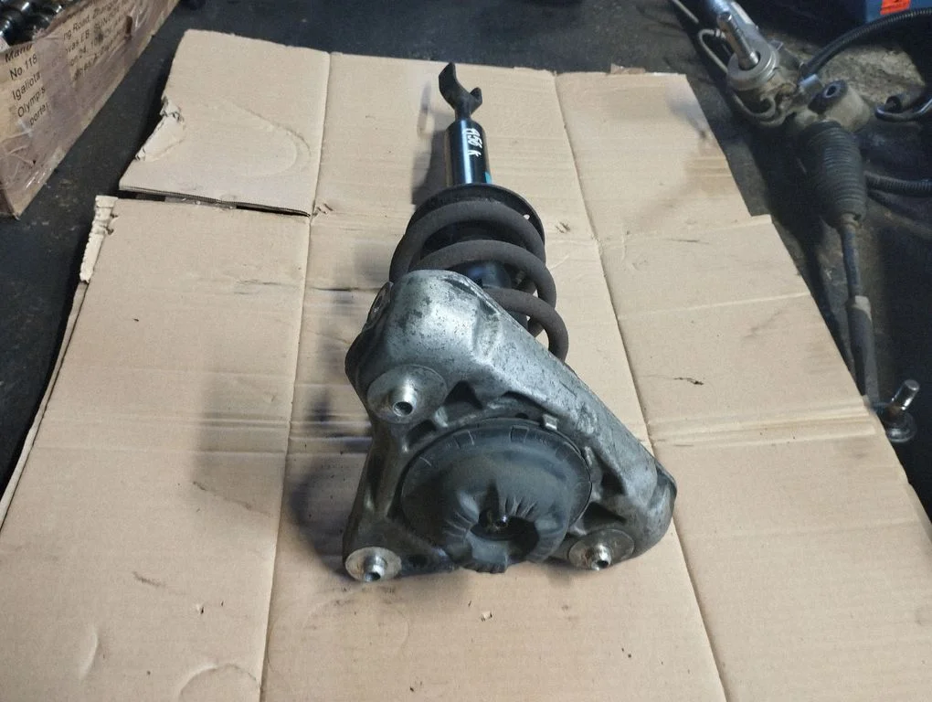 Front shock absorber with coil spring 558301