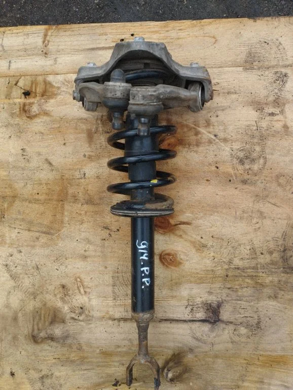 Front shock absorber with coil spring – Volkswagen Passat B5.5 (2001-2005)