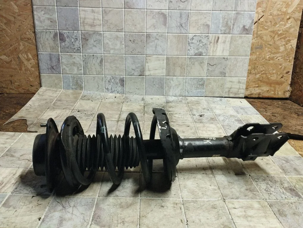 Front shock absorber with coil spring – Subaru Forester SH (2008-2013)