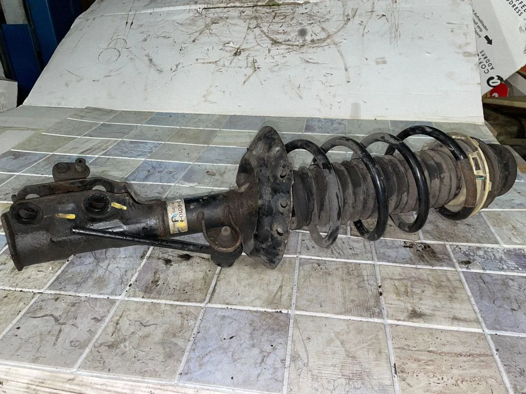 Front shock absorber with coil spring – right