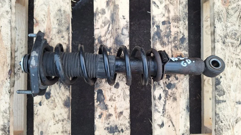 Rear shock absorber with coil spring – rear right