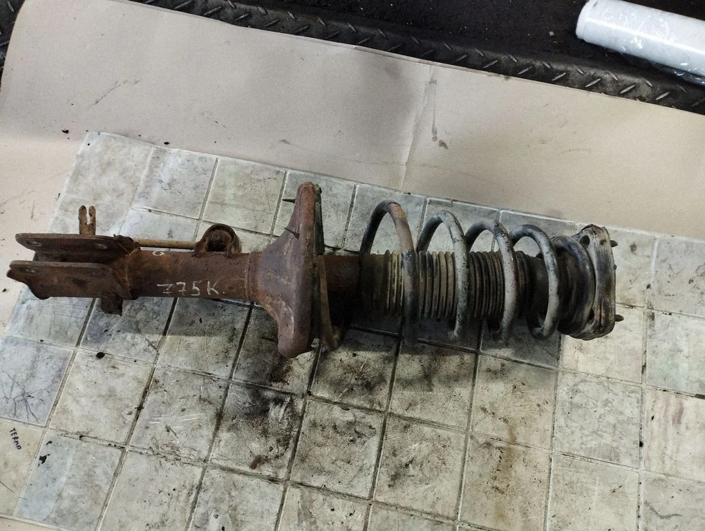 Rear shock absorber with coil spring – KIA Sportage (2005-2010)