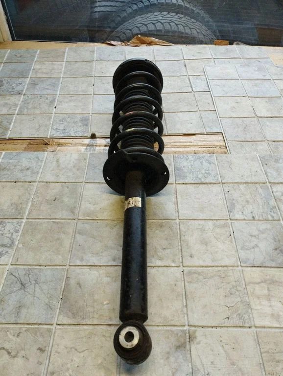 Rear shock absorber with coil spring – right