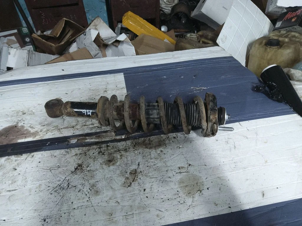 Rear shock absorber with coil spring – right